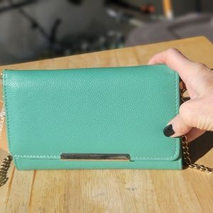 Francesca's green clutch/shoulder bag